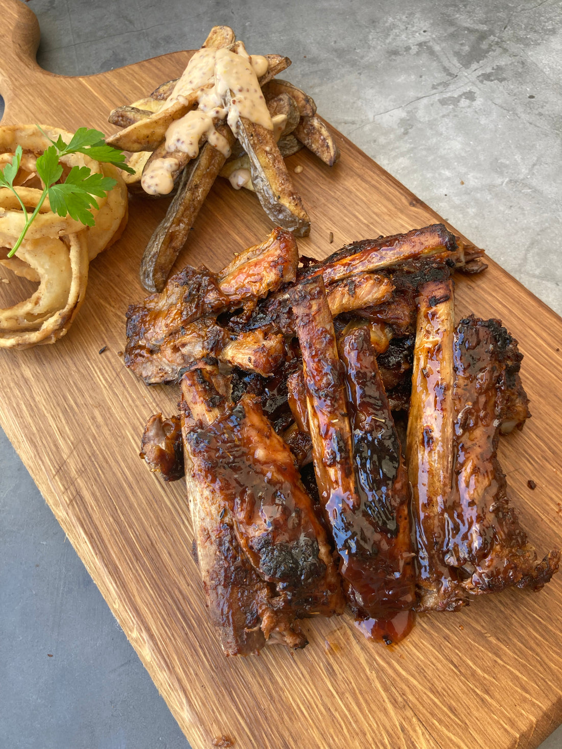 BBQ Ibérico St. Louis Ribs with French Fries & Onion Rings