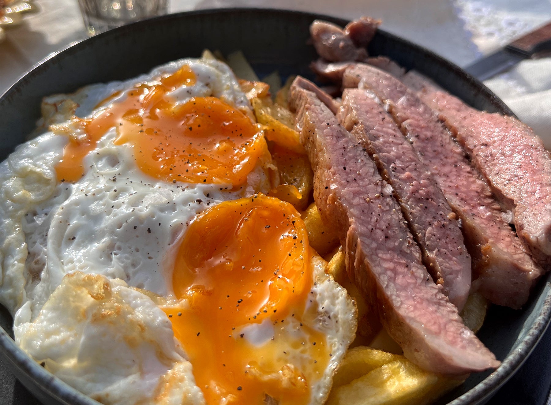 Huevos Rotos with Ibérico Secreto Steak