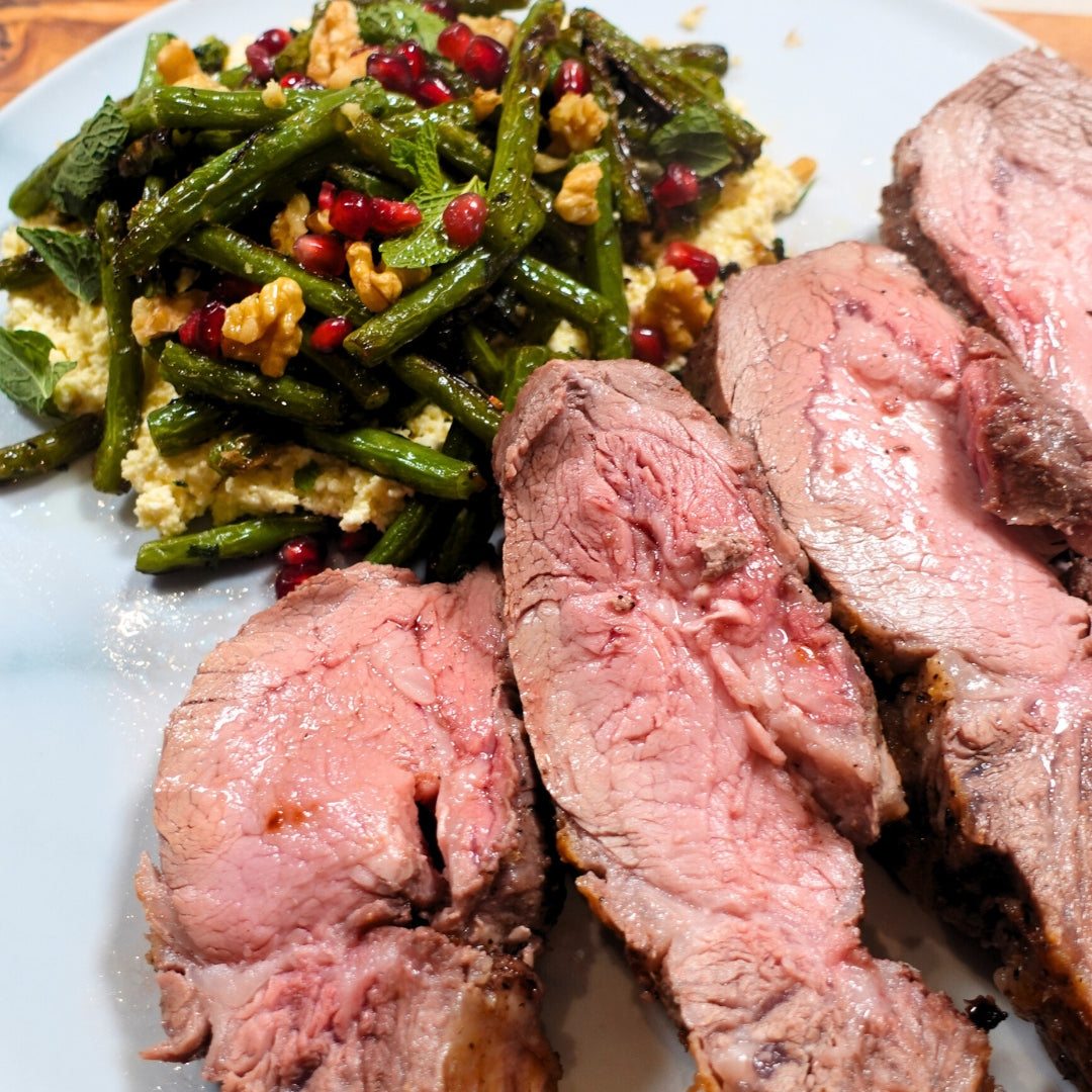 Oven baked pork chops with green beans feta garnish
