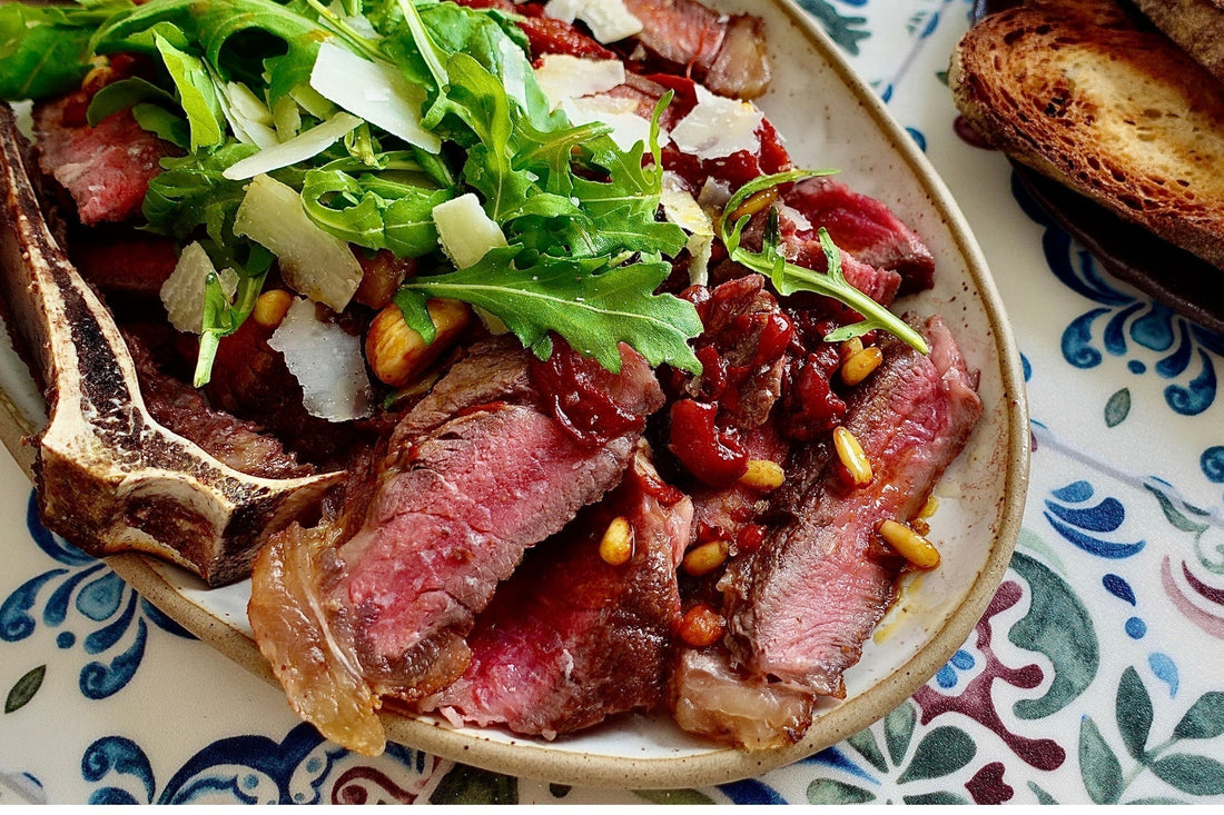 Grilled Vaca Vieja NY Strip Tagliata with Confit Peppers & Parmesan
