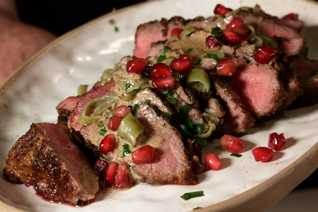 Sous Vide Ibérico Presa with easy balsamic sauce, piparras & pomegranate