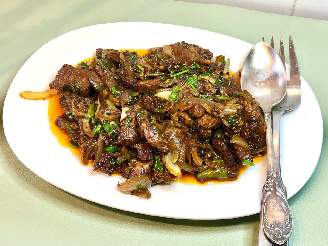 Cuminy Ibérico Pork Stir-Fry With Chiles and Scallions