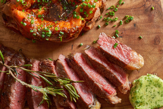 Cast Iron–seared Wagyu NY Strip with basted garlic-rosemary butter & sweet potato chimichurri