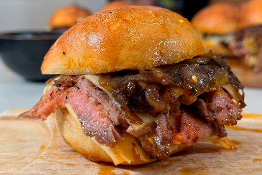 Hot honey Pluma Steak sliders with Swiss Cheese & caramelized onions