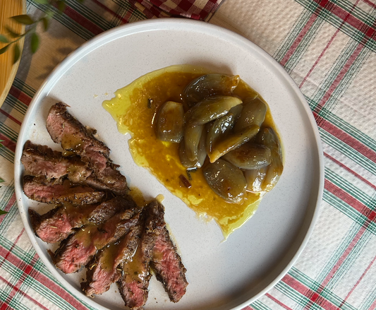 Skilled Ibérico Pluma Steak with Pearl Onions & Miso Butter