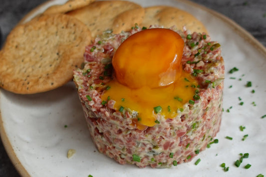 Ibérico Ham Tartare with Soy-Cured Egg Yolk & Crispy Toasts