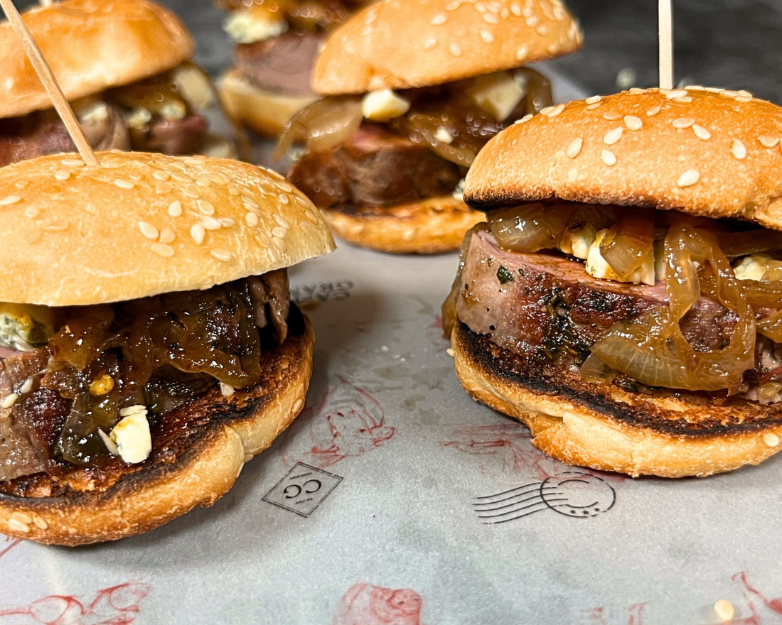 Mini Tenderloin burger with blue cheese and caramelized onion