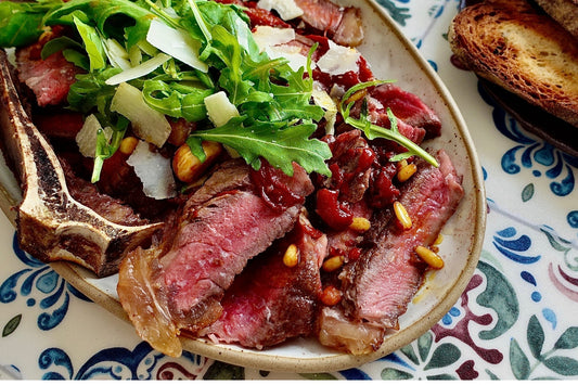 Grilled Vaca Vieja NY Strip Tagliata with Confit Peppers & Parmesan
