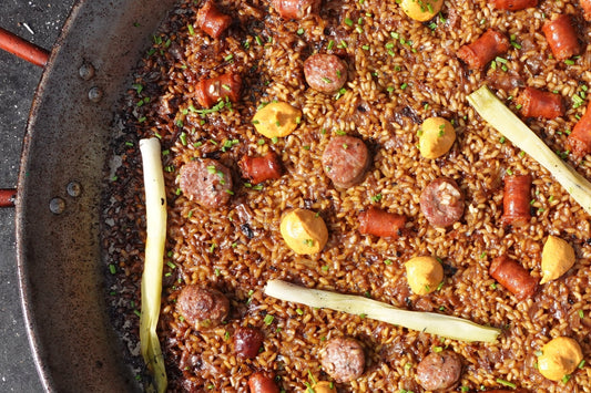 Paella with Spring Onion, Chistorra, and Butifarra: A Delicious Twist on the Classic Recipe