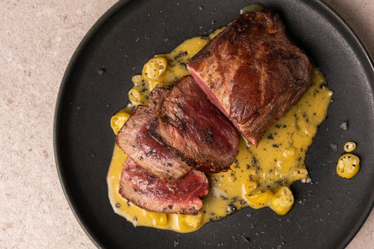 Grilled Ibérico Presa with Citrus-Mustard Coconut Sauce & Pickled Piparras