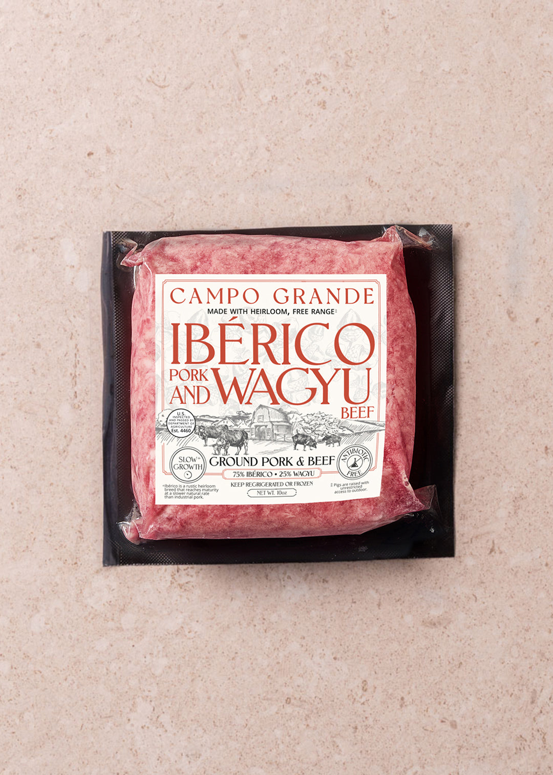 Ground pork and wagyu beef patty in black vacuum-sealed packaging labeled Campo Grande Iberico.