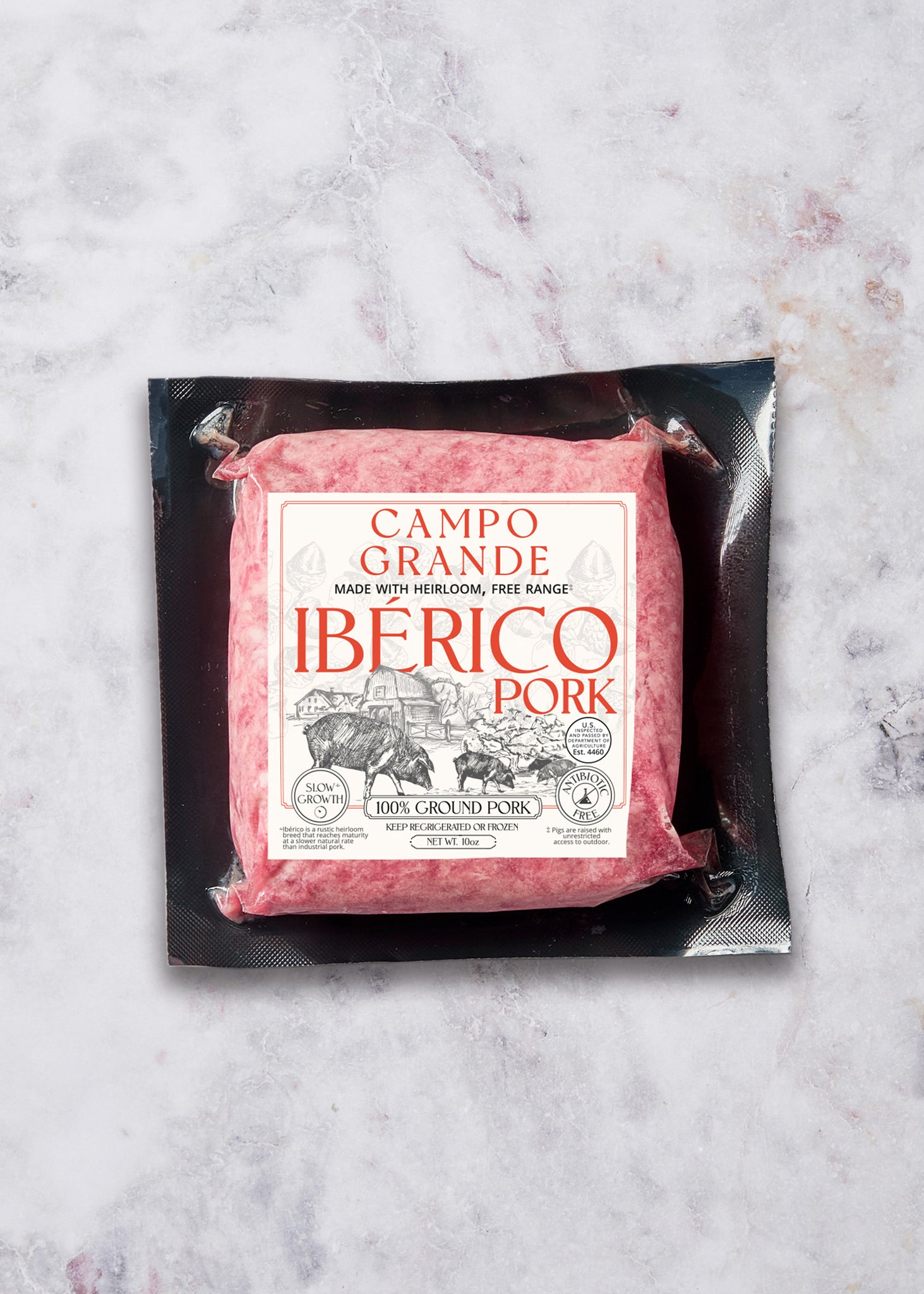 Campo Grande Iberico Pork ground pork package with red label on black tray against marble surface.